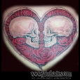 Heart surrounding skulls